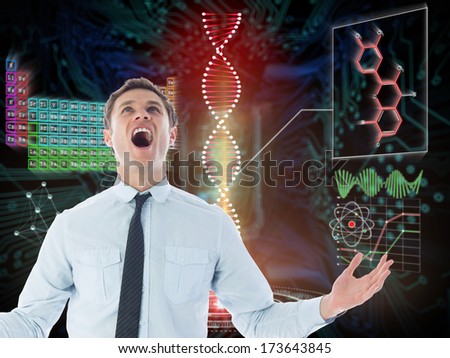 Shouting businessman against shiny key on black circuit board background