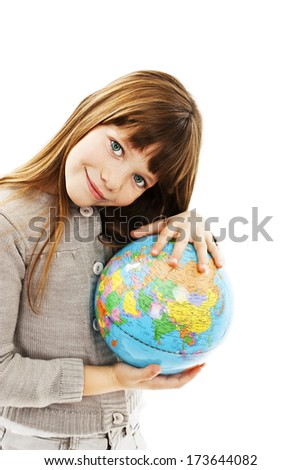Globe on child hands. Isolated on white background 