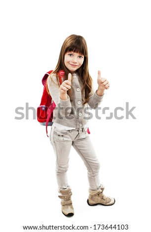 Adorable schoolgirl showing OK sign. Isolated on white background 