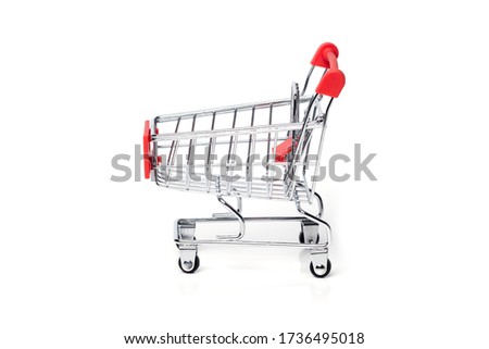 Empty trolley cart on a white background. Shopping, sale, finance and business concept. 