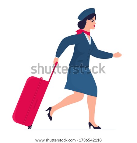 Stewardess with a suitcase hurries for the flight. Opening of cordons after quarantine.