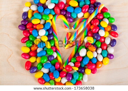 frame  a background from colorful sweets of sugar candies