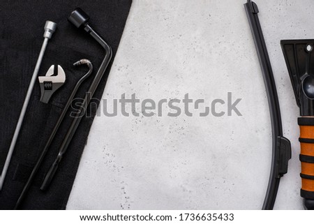 Adjustable and spanner, hexagon and wiper blade auto equipment. The wrench steel tools for repair and hexagon tool or allen wrench set on light gray background.