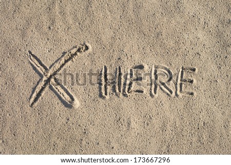 Mysterious sign on sand.