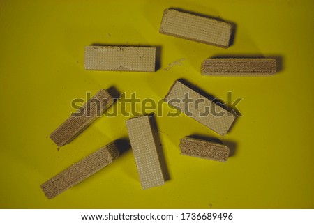 Crunchy waffles in a stock photo on a yellow background