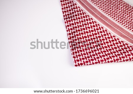 Ghutrah also known as Keffiyeh or Shmag. This item of clothing are usually worn by men as a traditional head-dress in Arab Countries especially in gulf countries such as Saudi Arabia. Royalty-Free Stock Photo #1736696021