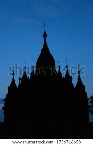 Silhouette of an old temple in Bagan with night sky as background