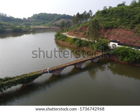 Aerial photography of ancient bridge in rural China