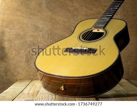 Acoustic guitar on wood floors