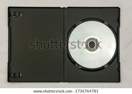 Black plastic covers to put CD, DVD or blu-ray with white background