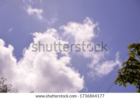 Sunny sky with clouds in clear spring weather