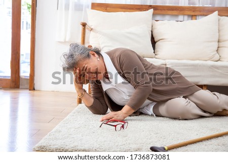Elderly stroke, Asian older woman suffer from stroke and powerful headache or brain attack Royalty-Free Stock Photo #1736873081