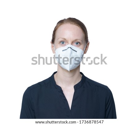 Close up picture of a woman wearing a KN95 FPP2 mask Royalty-Free Stock Photo #1736878547