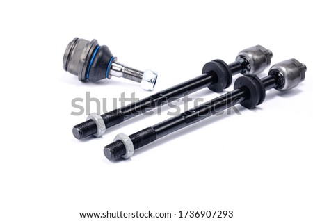 Auto parts, tie rods and ball joint on a white background, close-up. Car suspension repair. Place for text car dealerships