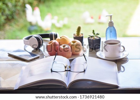 Place books on the table to relax in nature