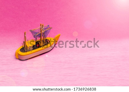 Travel Ideas and Concepts. Model of Old Sail Boat Placed Over Pink Background with Sunflares Added. Horizontal Image
