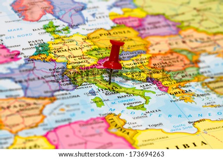Map of Italy with a white pushpin stuck Royalty-Free Stock Photo #173694263