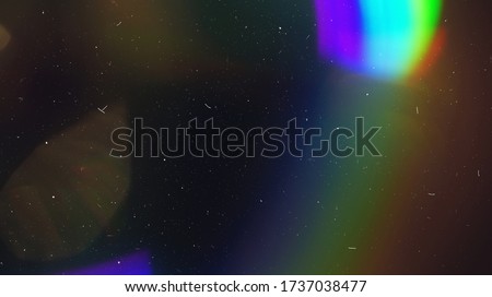 Rainbow Lens Optical Flare Film Dust Overlay Effect Vintage Abstract Bokeh Light Leaks Photo Retro Camera Defocused Blur Reflection Bright Sunlights. Use Screen Overlay Mode for Photo Processing. Royalty-Free Stock Photo #1737038477