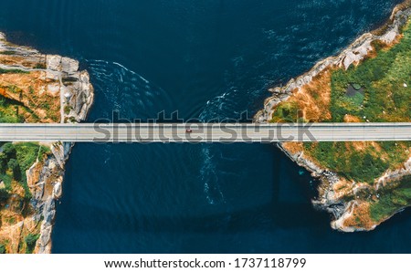 Aerial view Saltstraumen bridge in Norway road above sea connecting islands top down scenery transportation infrastructure famous landmarks scandinavian landscape Royalty-Free Stock Photo #1737118799