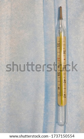 thermometer health care medical tool textile cloth texture background surface vertical picture concept