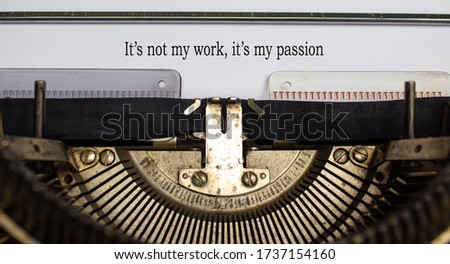 Text 'it's not my work, it's my passion' typed on retro typewriter. Business concept.