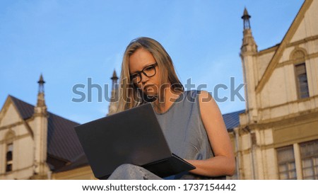 Girl Working Outdoor On Laptop.