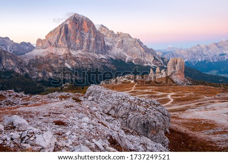 Next to the beautiful Cinque Torri mountains are the Tofana di rozes mountains, close to the town of Cortina d’Ampezzo, at the Falzarego pass in the province of Belluno in northern Italy Royalty-Free Stock Photo #1737249521