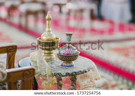 The brass gravel blurry image,Placed on the table of the chairman at the ceremony Used in various events such as funerals, housewarming, weddings, often seen in Thailand And Asia