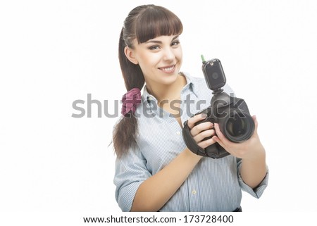 Portrait of Young Caucasian Woman Taking Images With Professional Photo Camera. isolated on a white. Horizontal Image