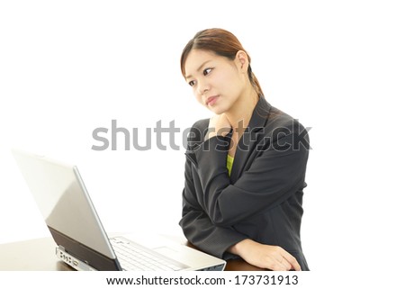 The female office worker who is troubled with stiff shoulder