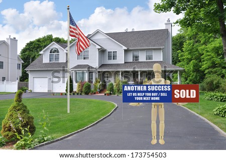 American Flagpole Sold Real Estate Sign held by adult wood mannequin standing in driveway of suburban McMansion style home residential neighborhood USA blue sky clouds