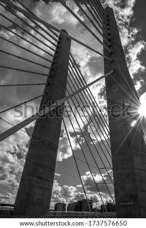 Black and white photograph of the Tilikum Crossing pedestrian bridge in Portland, Oregon