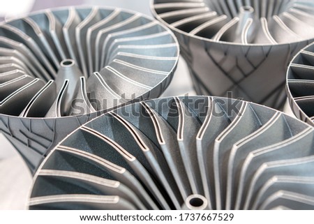 Metal products made by metal 3D printing. Modern additive technology. Royalty-Free Stock Photo #1737667529