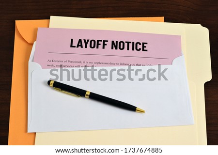 An illustrative image to show a letter sent to employees or workers of layoff notice. Business concept image for unemployment. Royalty-Free Stock Photo #1737674885