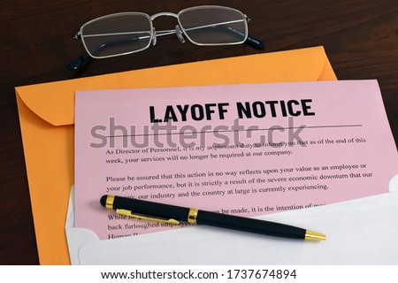 An illustrative image to show a letter sent to employees or workers of layoff notice. Business concept image for unemployment. Royalty-Free Stock Photo #1737674894