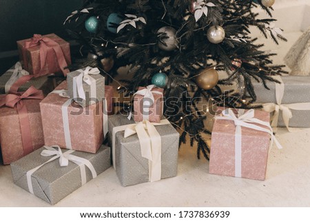 many gifts under the Christmas tree