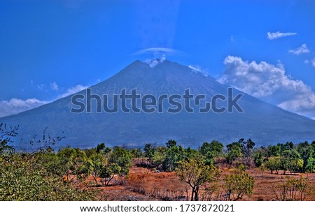 Mt. Agung against blue skay on sunny day