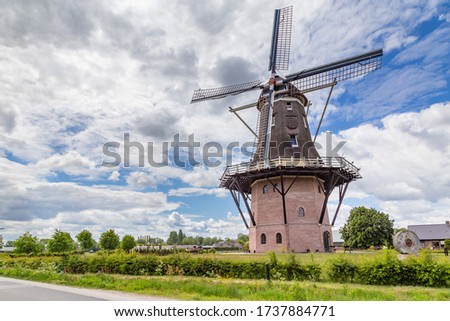 Dutch windmill Puurveense molen in small village Kootijkerbroek, on the Veluwe, in the municipality of Barneveld, Gelderland, Netherlands.