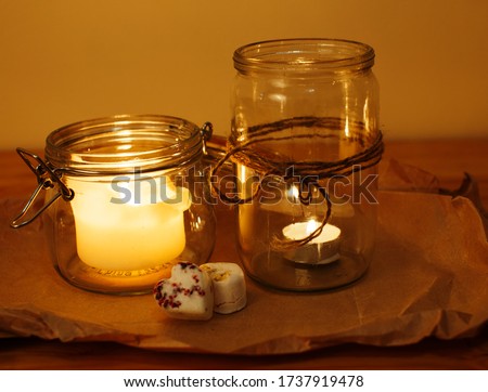 candles on wooden table, aroma therapy concept close up