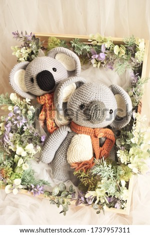 Koala crochet. Koala bear. Crocheting. Handmade. Knitting background. Pastel vintage color. Vintage theme. Home decoration. Woolen animal. Soft toy. Art handicraft. Woolen. Forest. Animal toy for kids