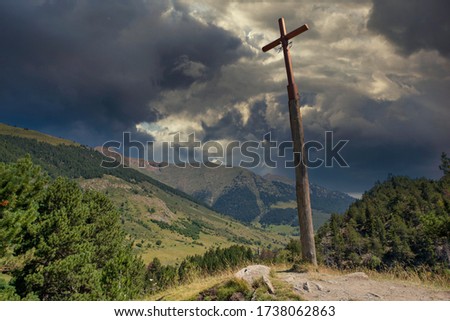Christian cross on the road to montgarri from the valley of aran, Spain
