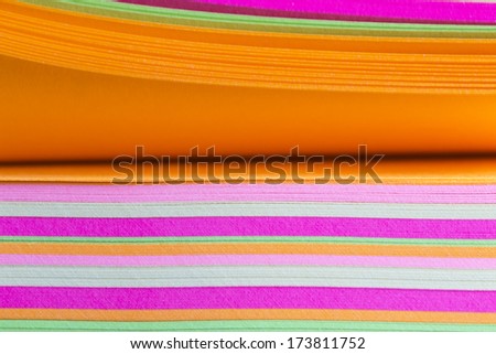 abstract colored cardboard stacked with textures