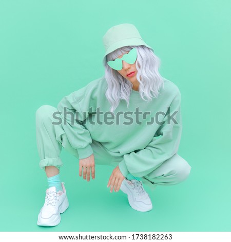 Fresh Mint urban look. Fashion Girl 90s. Monochrome color trends. Aqua Menthe aesthetic concept Royalty-Free Stock Photo #1738182263