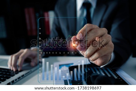 Double exposure of financial graph. Stock market chart - Businessman hand using stock market or forex graph - Forex investment business network technology concept - Modern digital tablet.