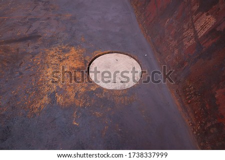 bilge well cover protected by means of burlap for transportation of bulk cargo, tank top plating of cargo hold on bulk carrier Royalty-Free Stock Photo #1738337999