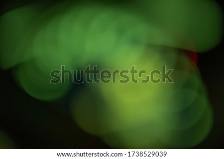 Green and black bokeh background, macro photo