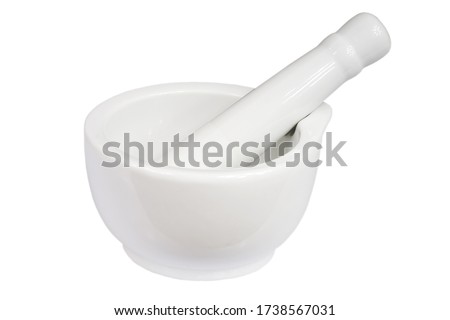 White mortar for grinding medicine with a pestle on a white background isolated.