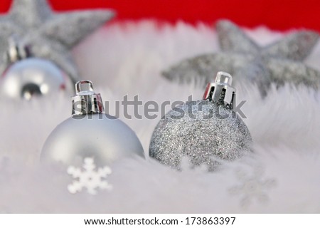 silver christmas decoration with fake snow made of white fur stock, photo, photograph. Christmas Red silver decorations bauble sparkle glitter Christmas decoration with fluffy fake snow made of white 