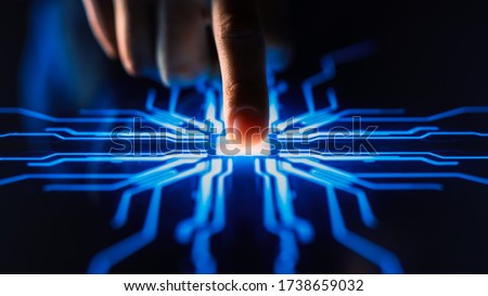 Digitalization Concept: Human Finger Pushes Touch Screen Button and Activates Futuristic Artificial Intelligence. Visualization of Machine Learning, AI, Computer Technology Merge with Humanity Royalty-Free Stock Photo #1738659032
