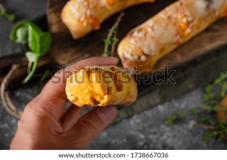 Delicious pastry stuffed with sharp cheese with cheese dip